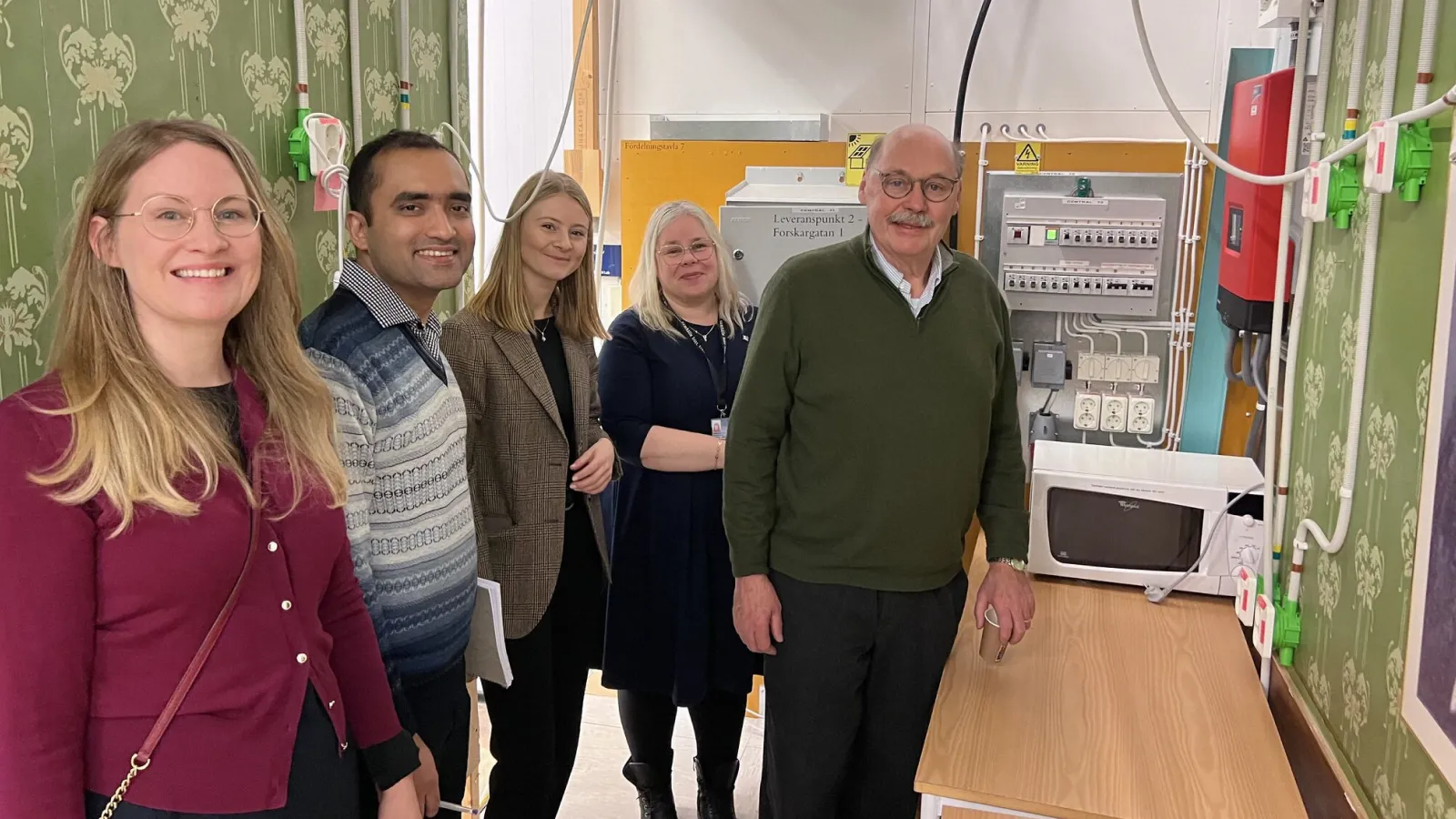 The hardware team showing off a sensor setup in the lab